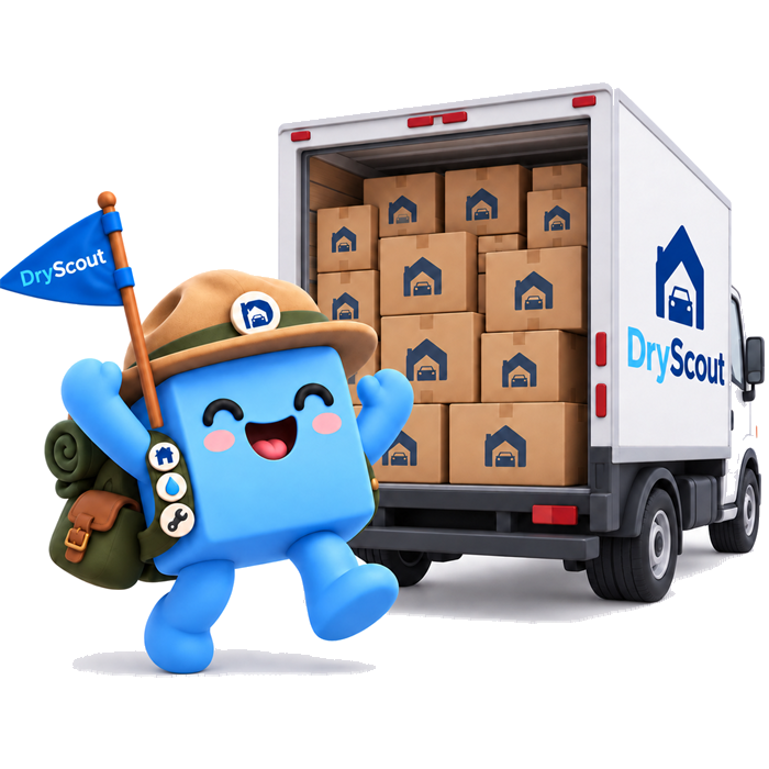 Jax, the DryScout scout, celebrating beside a fully packed truck
